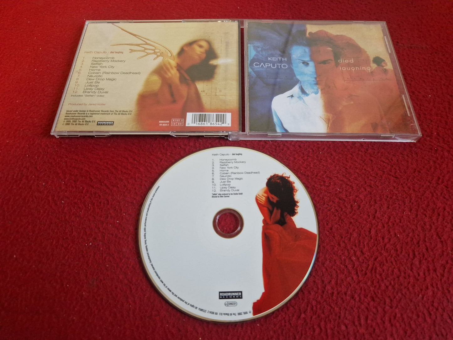 KEITH CAPUTO DIED LAUGHING CD