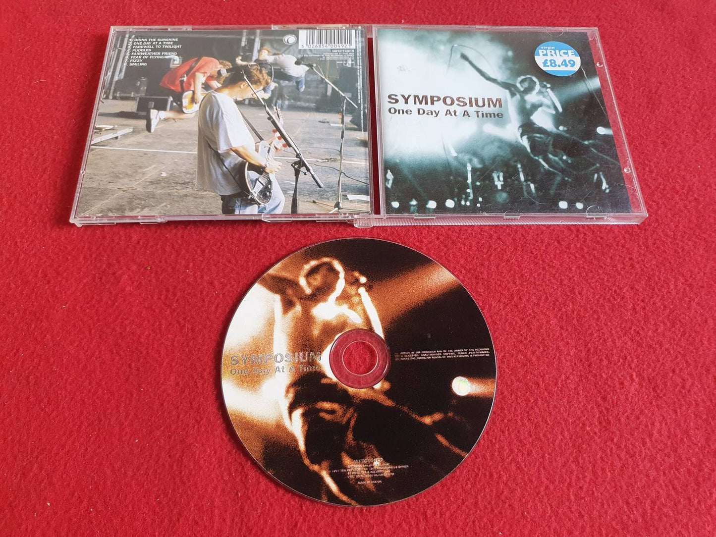 SYMPOSIUM ONE DAY AT A TIME till CD