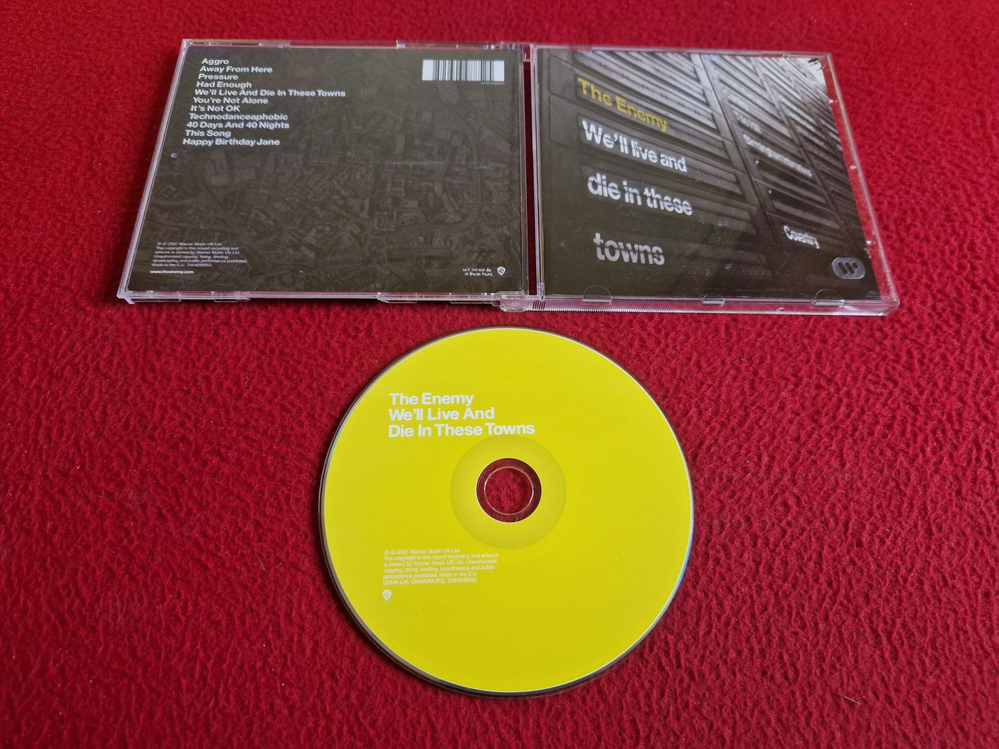 THE ENEMY WE'LL LIVE AND DIE IN THESE TOWNS CD
