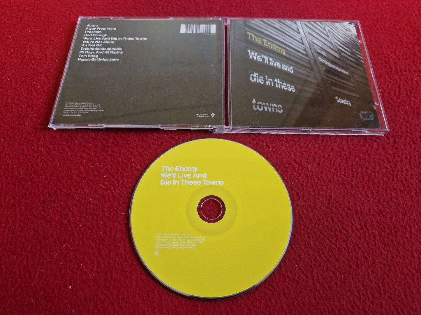 THE ENEMY WE'LL LIVE AND DIE IN THESE TOWNS CD