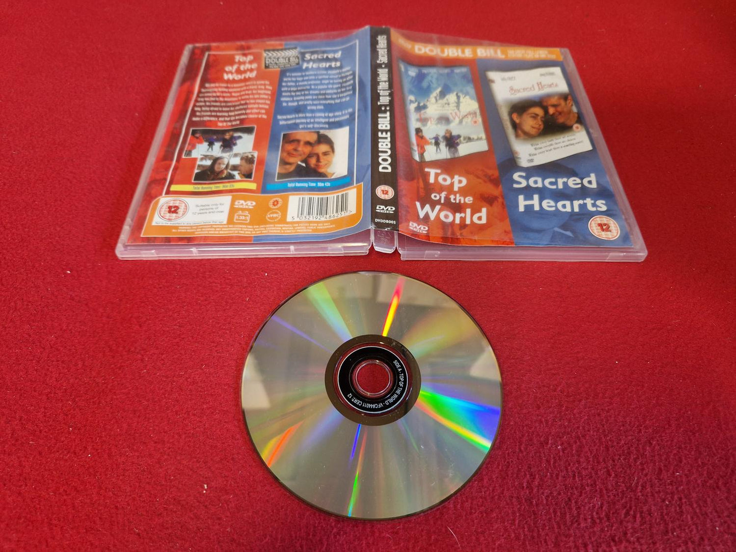 TOP OF THE WORLD / SACRED HEARTS till DVD