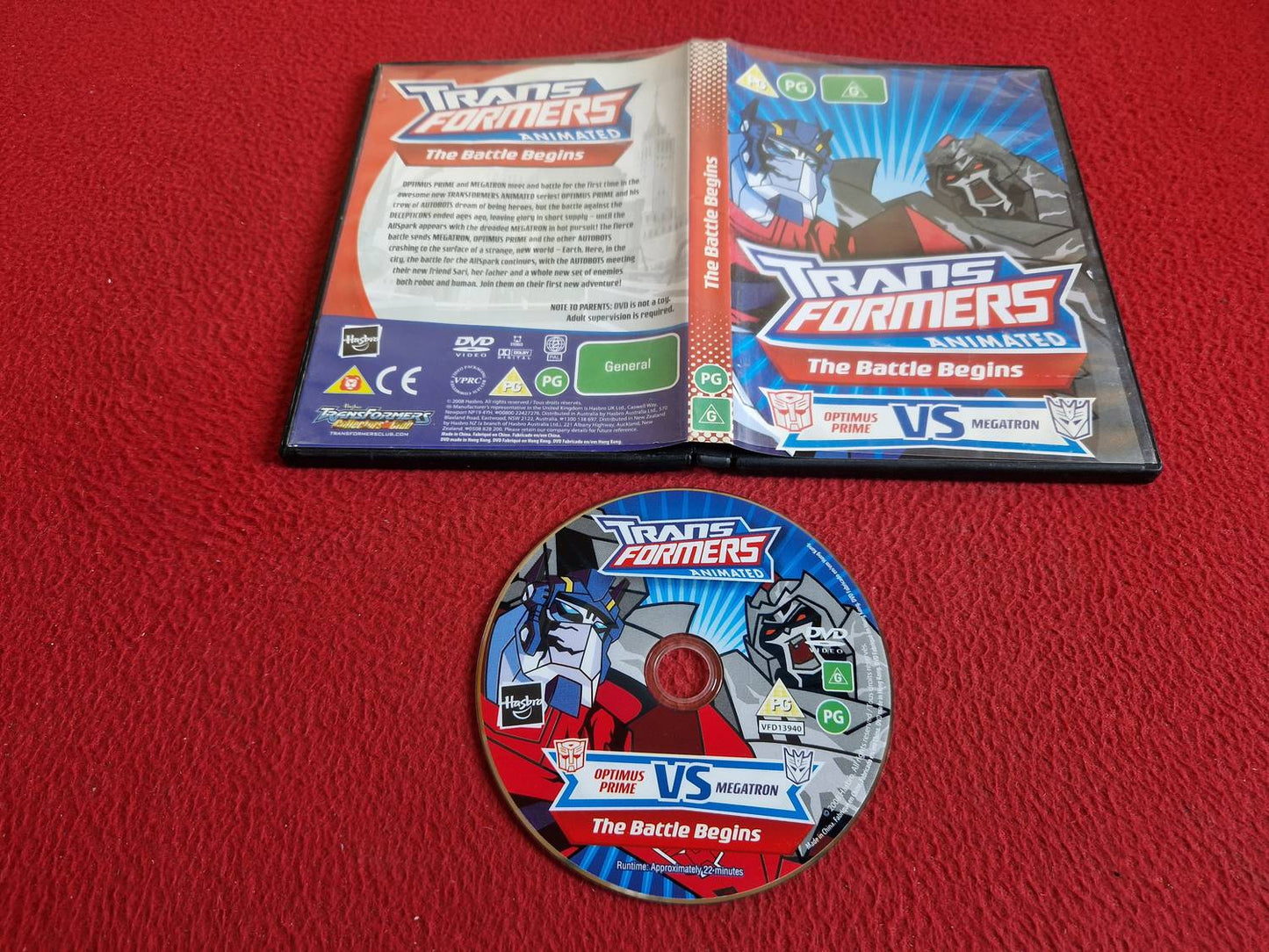 TRANSFORMERS THE BATTLE BEGINS OPTIMUS PRIME VS MEGATRON DVD