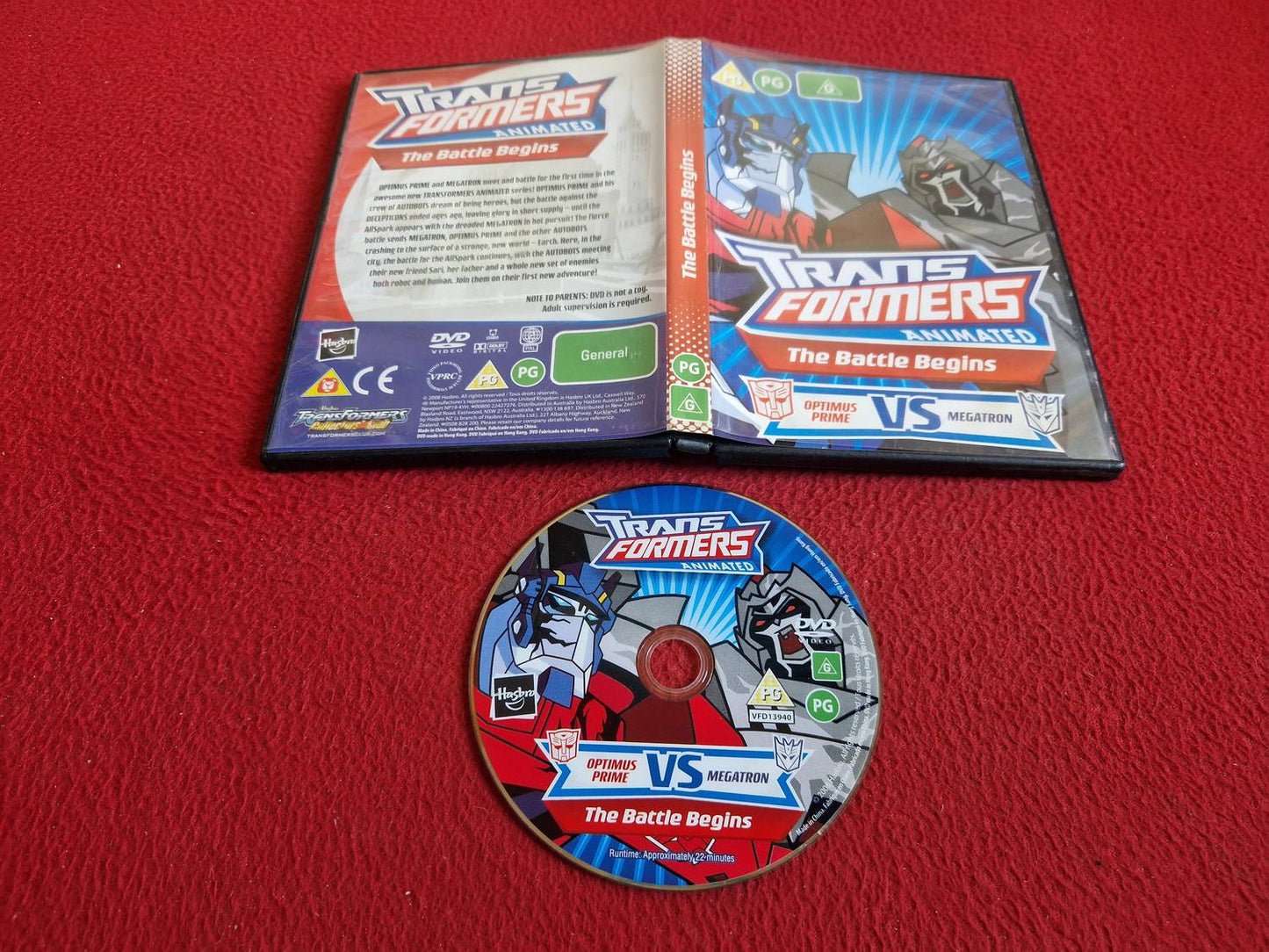 TRANSFORMERS THE BATTLE BEGINS OPTIMUS PRIME VS MEGATRON DVD
