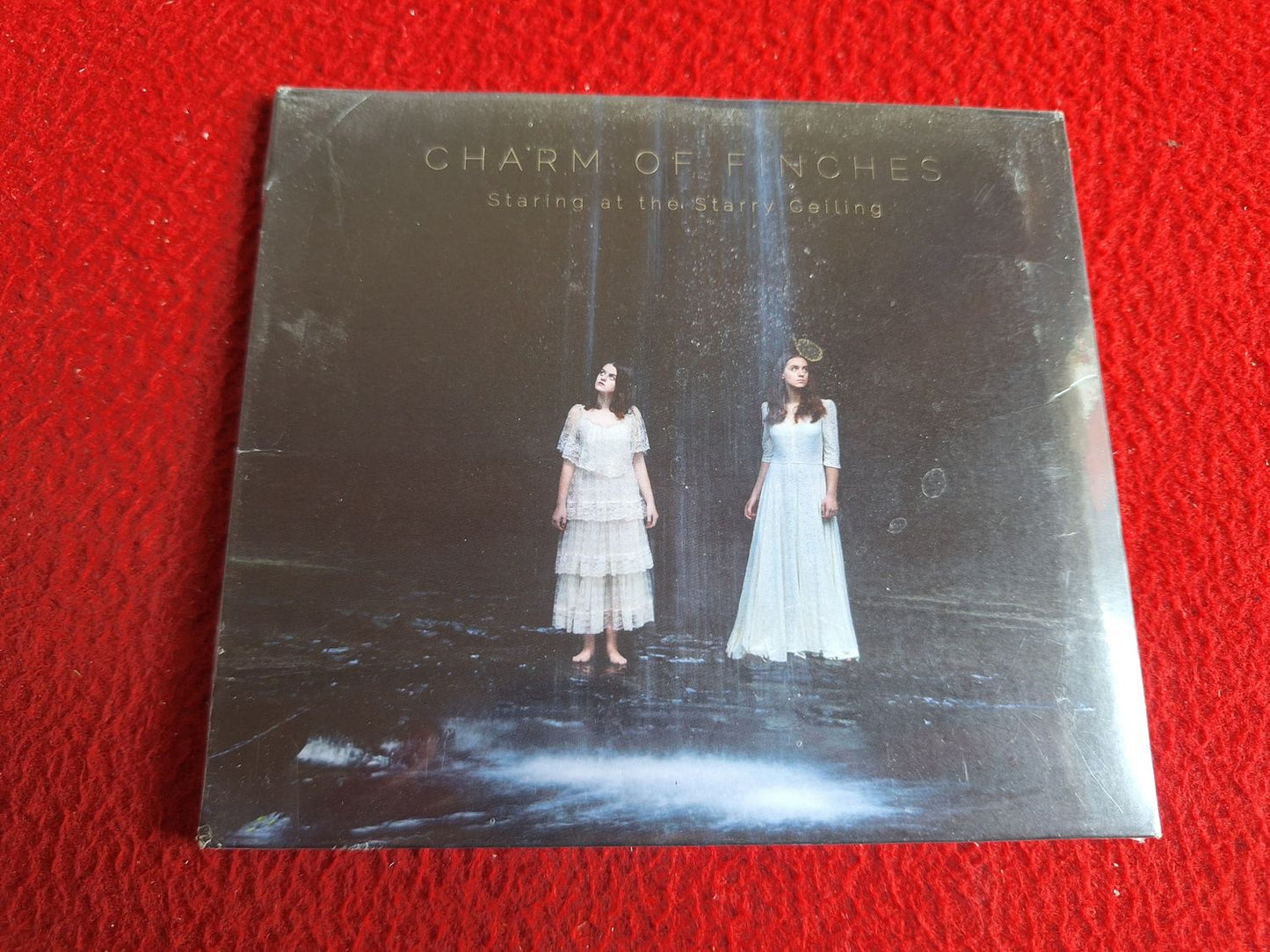 CHARM OF FINCHES STARING AT THE STARRY CEILING [ OÖPPNAD ] CD