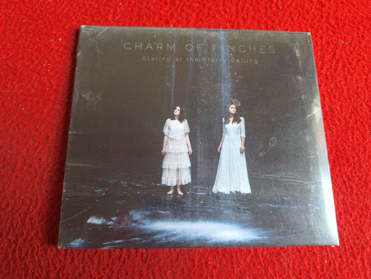 CHARM OF FINCHES STARING AT THE STARRY CEILING [ OÖPPNAD ] CD