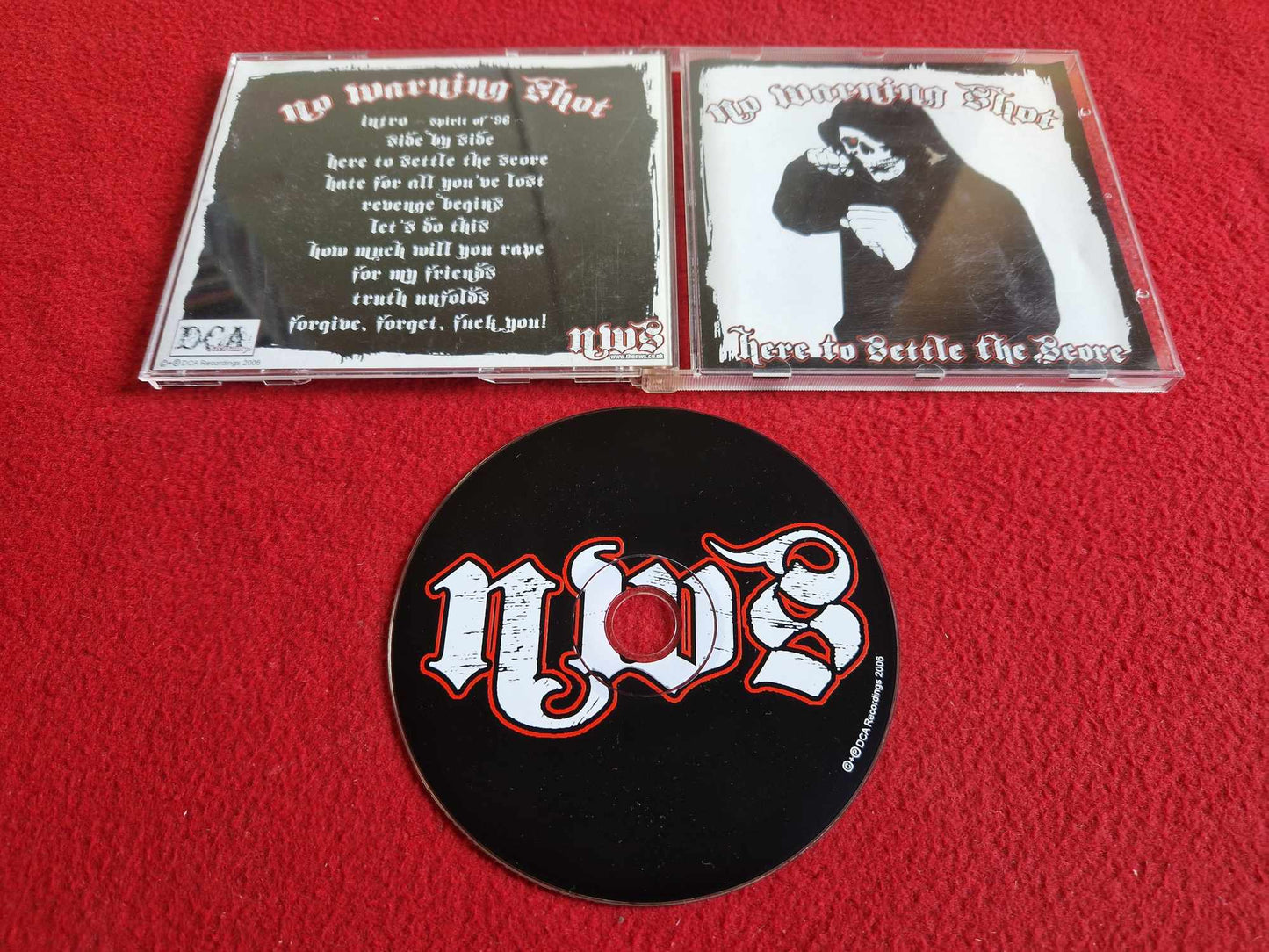 NO WARNING SHOT HERE TO SETTLE THE SCORE CD