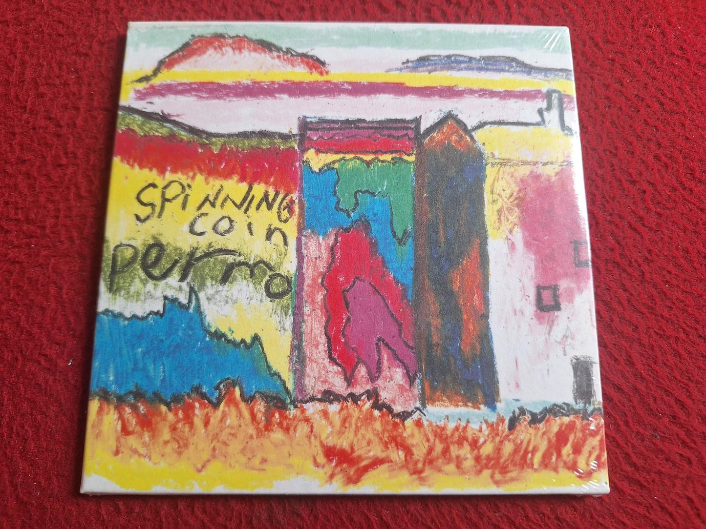 PERMO SPINNING COIN CD