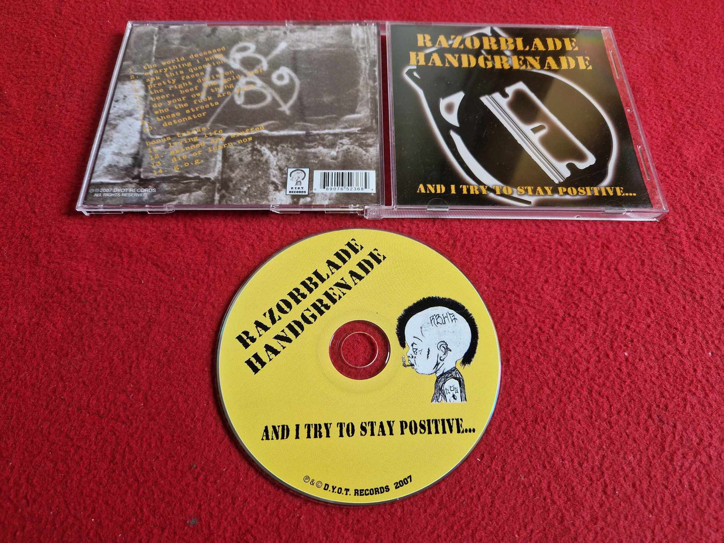 RAZORBLADE HANDGRENADE AND I TRY TO STAY POSITIVE CD
