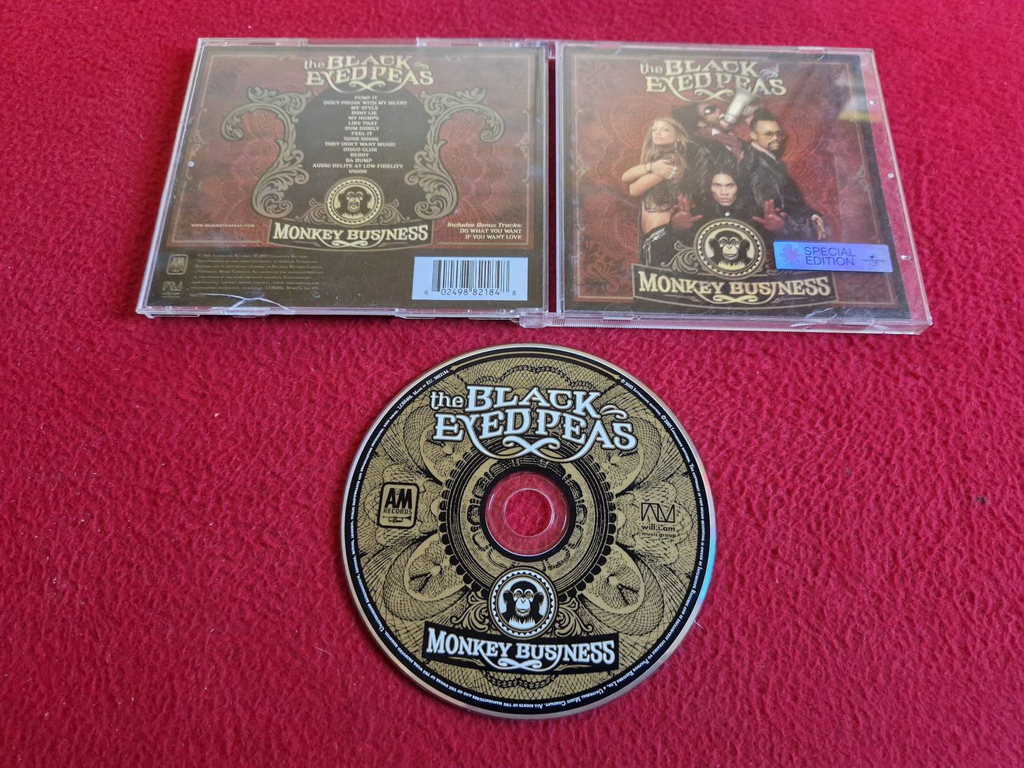 THE BLACK EYED PEAS MONKEY BUSINESS CD