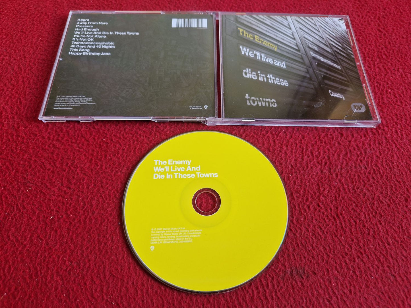THE ENEMY WE'LL LIVE AND DIE IN THESE TOWNS CD