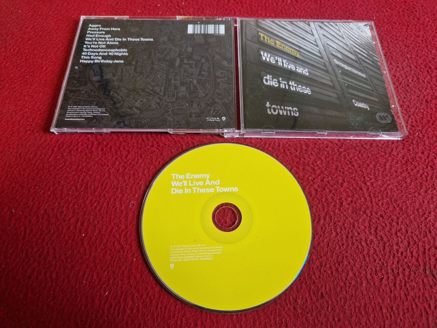 THE ENEMY WE'LL LIVE AND DIE IN THESE TOWNS CD