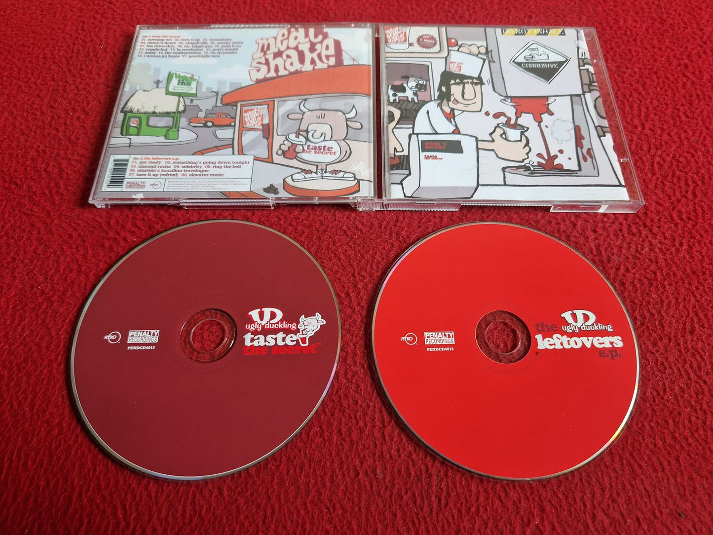 THE UGLY DUCKLING LEFTOVERS EP / TASTE THE SECRET CD